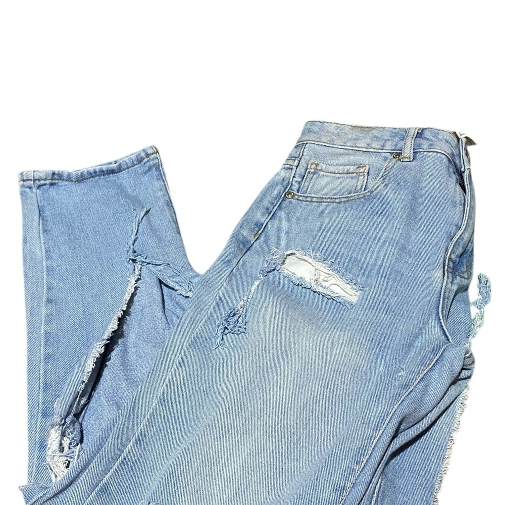 Distressed Light Blue Denim Jeans